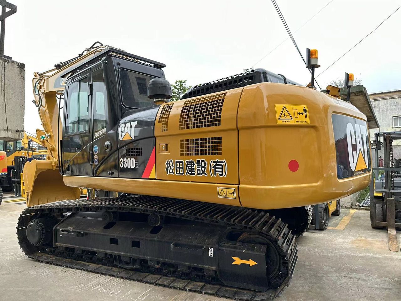 2023 Caterpillar 330D2 crawler excavator, side view 2023 Caterpillar 330D2 crawler excavator, side view