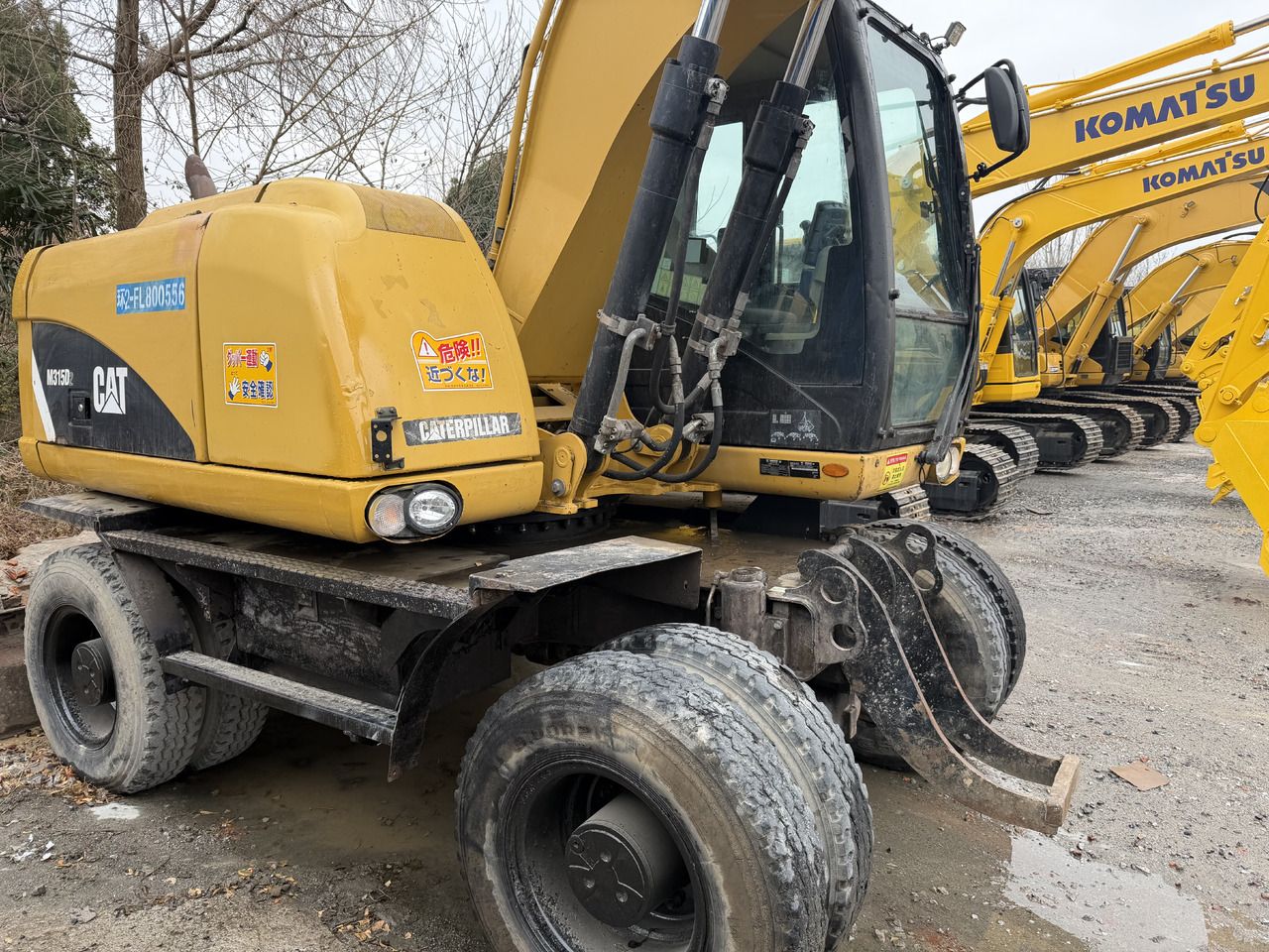 2018 Caterpillar M315D2 wheel excavator, side view 2018 Caterpillar M315D2 wheel excavator, side view