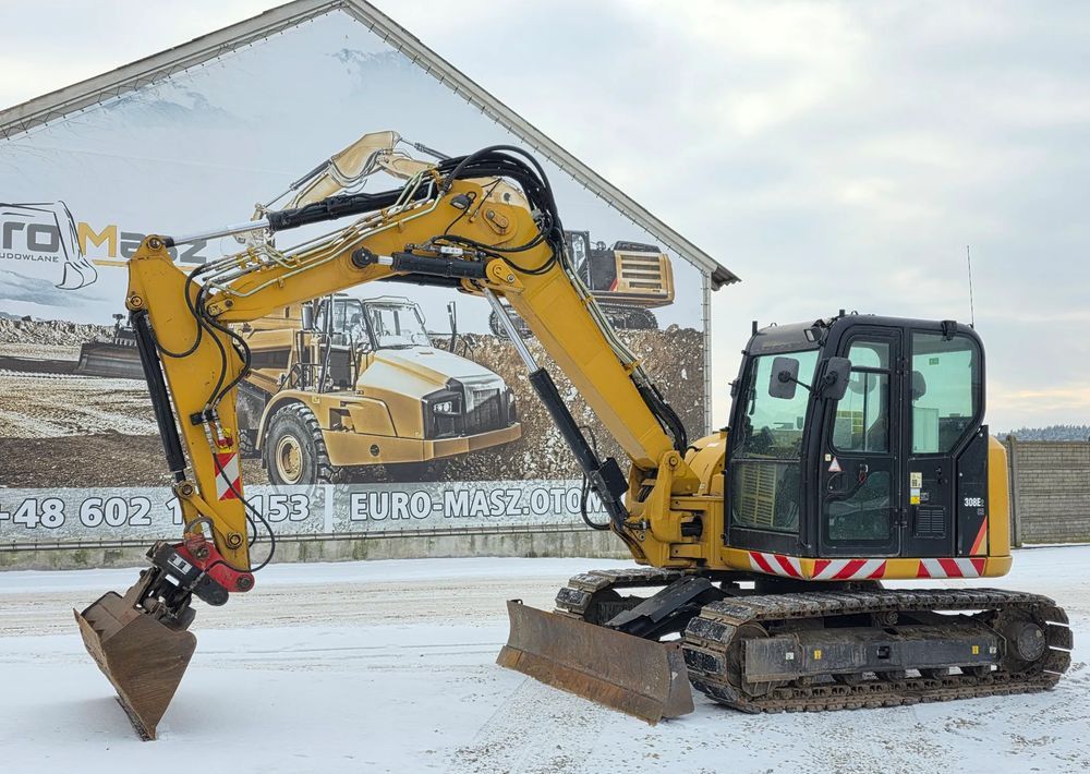 2016 Caterpillar 308E2CR crawler excavator side view 2016 Caterpillar 308E2CR crawler excavator side view