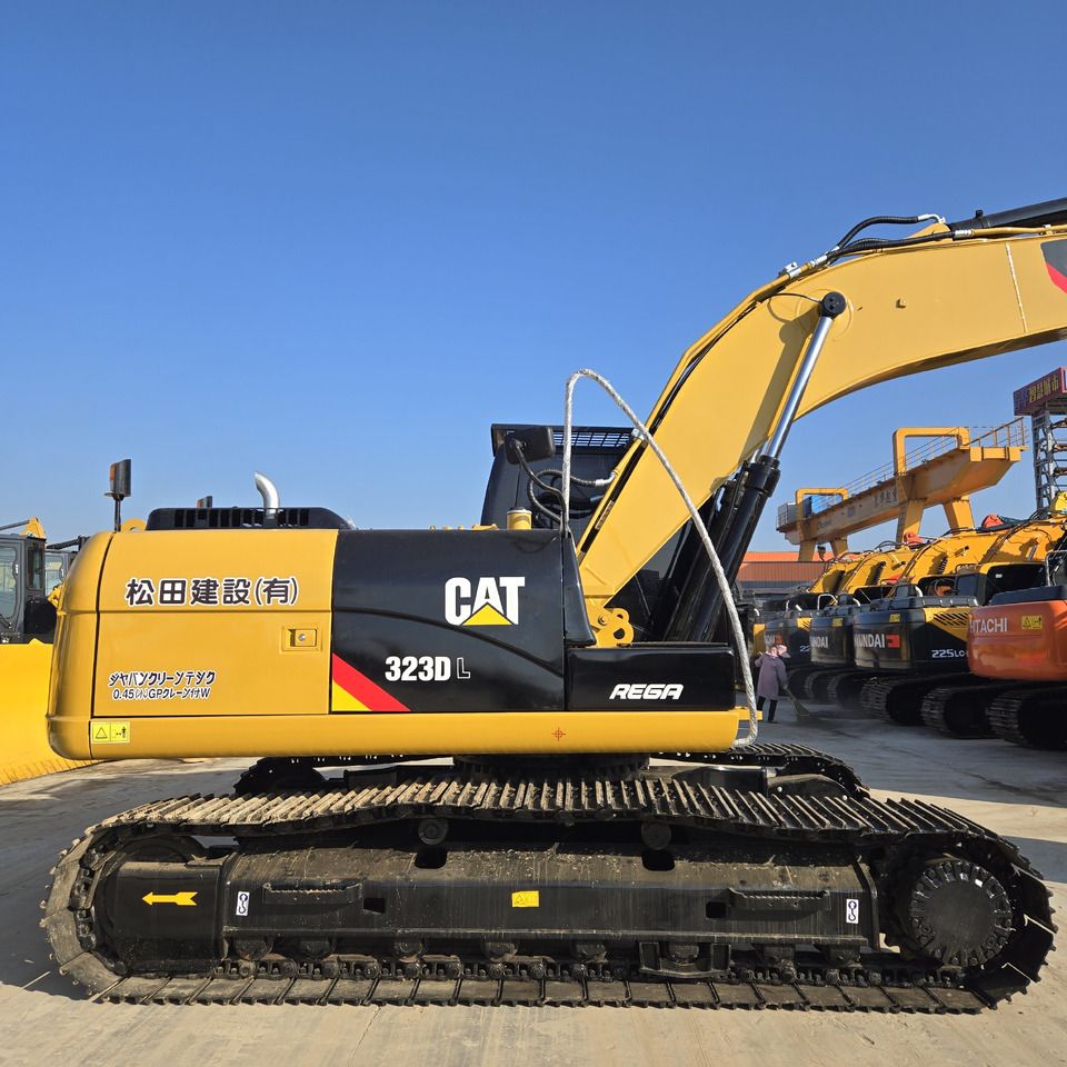 2022 Caterpillar 323DL crawler excavator, side profile view 2022 Caterpillar 323DL crawler excavator, side profile view