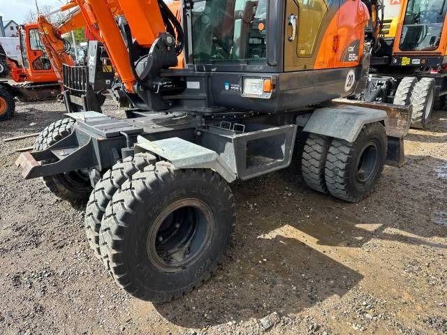 2014 Doosan DX55W wheel excavator side view 2014 Doosan DX55W wheel excavator side view