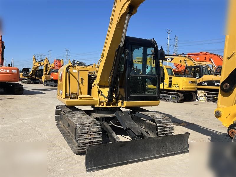 2024 Caterpillar 308E2 crawler excavator, rear three-quarter view 2024 Caterpillar 308E2 crawler excavator, rear three-quarter view