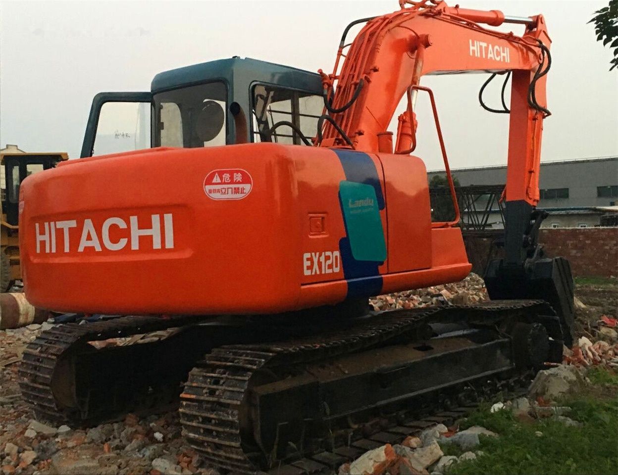 2018 Hitachi EX120-3 crawler excavator rear three-quarter view 2018 Hitachi EX120-3 crawler excavator rear three-quarter view