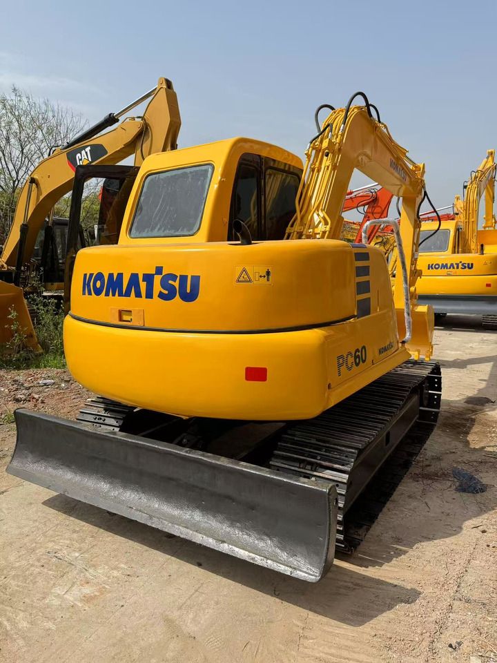 2018 Komatsu PC60-7 mini excavator, rear three-quarter view 2018 Komatsu PC60-7 mini excavator, rear three-quarter view