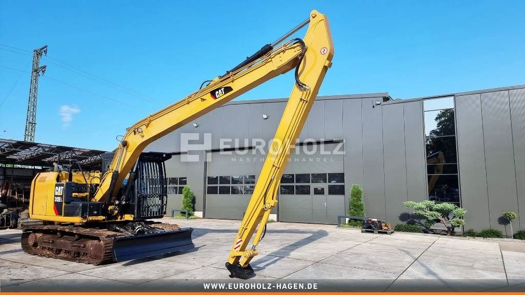 2016 Caterpillar 312EL crawler excavator, side profile view