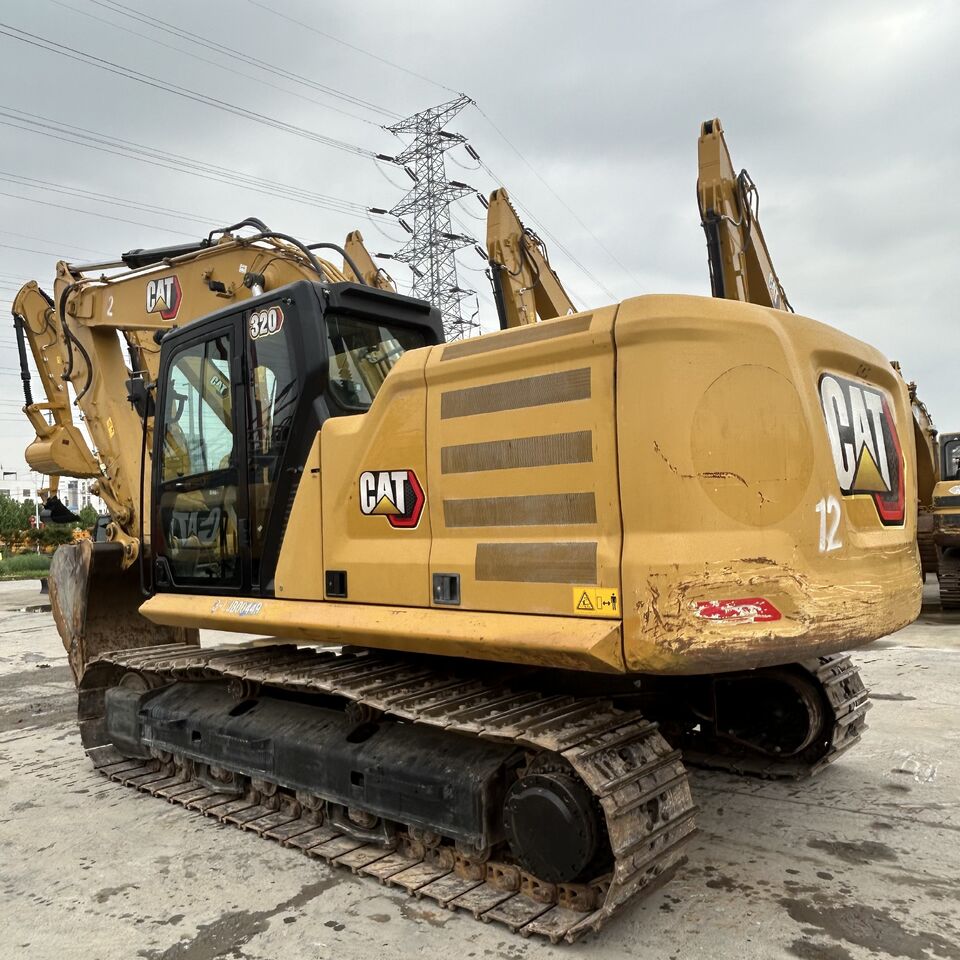 2018 Caterpillar 320 crawler excavator, rear three-quarter view
