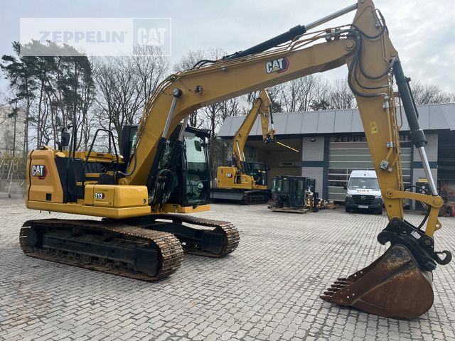 2022 Caterpillar 313-07A crawler excavator side view 2022 Caterpillar 313-07A crawler excavator side view