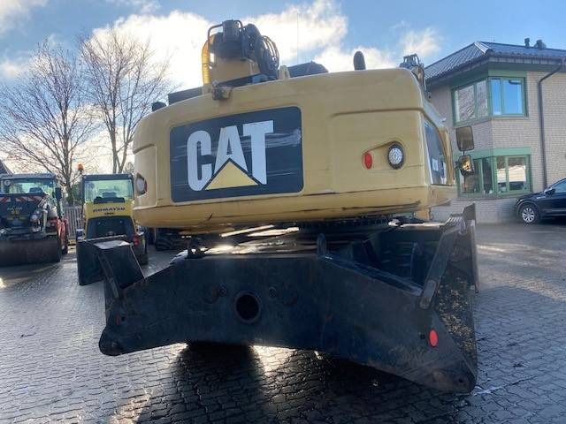 2012 Caterpillar M318D MH material handler rear view 2012 Caterpillar M318D MH material handler rear view
