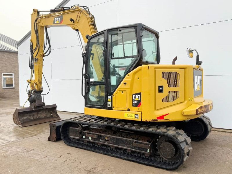 2019 Caterpillar 308 CR mini excavator, rear three-quarter view 2019 Caterpillar 308 CR mini excavator, rear three-quarter view