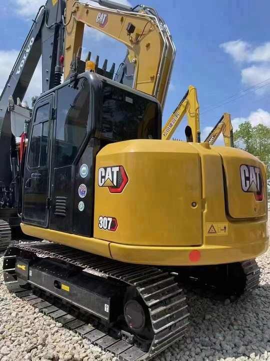 2024 Caterpillar 307E excavator rear three-quarter view