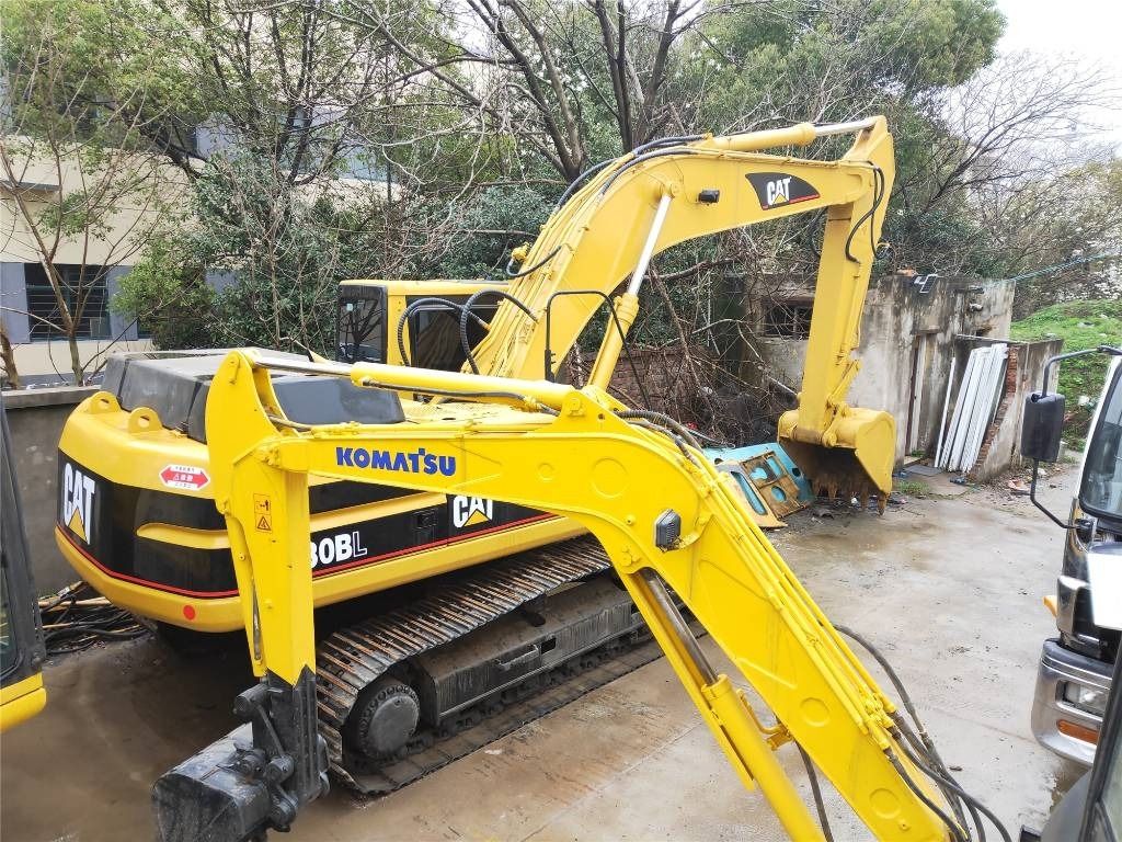 2023 Caterpillar 330BL crawler excavator, rear three-quarter view