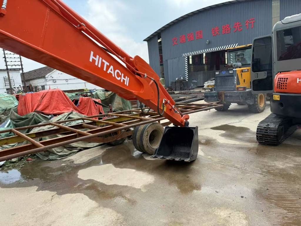 2024 Hitachi ZX60 mini excavator, side view of boom and bucket
