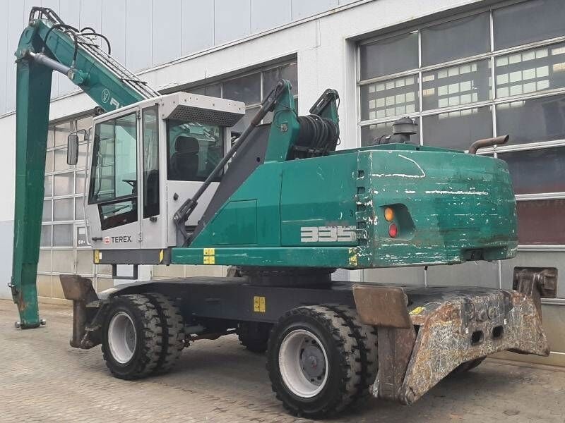2016 Fuchs MHL335 E material handler, rear three-quarter view