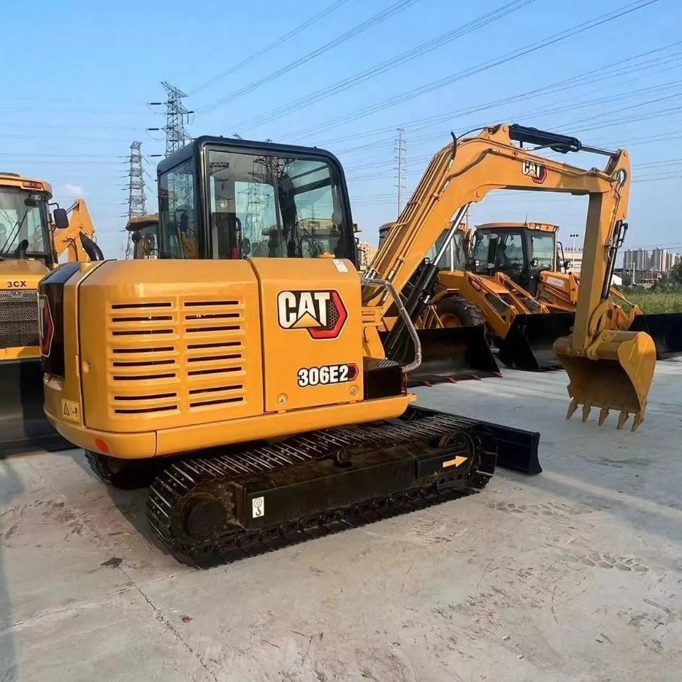 2023 Caterpillar 306E2 mini excavator, rear three-quarter view 2023 Caterpillar 306E2 mini excavator, rear three-quarter view