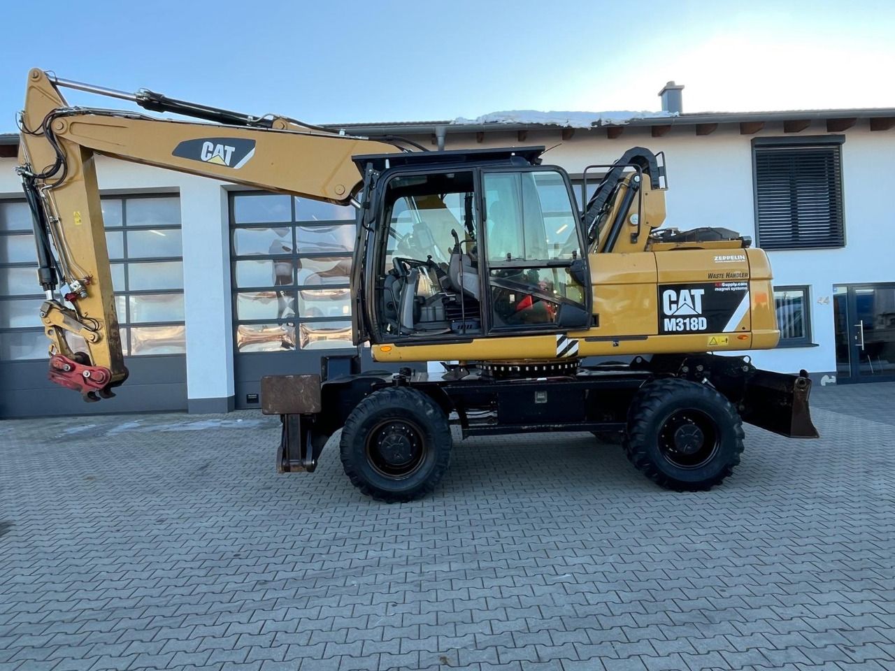 2013 Caterpillar M318D wheel excavator, side profile view 2013 Caterpillar M318D wheel excavator, side profile view