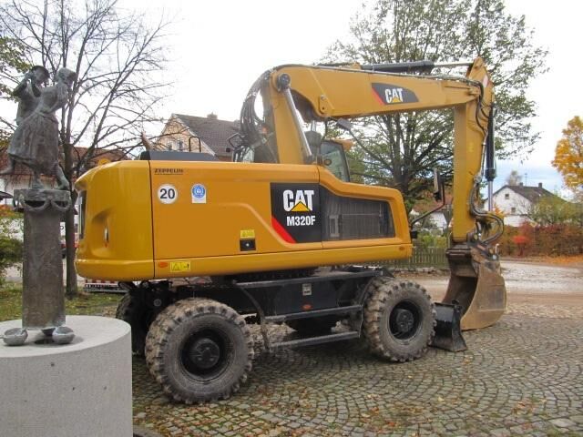 2021 Caterpillar M320F wheel excavator, side view 2021 Caterpillar M320F wheel excavator, side view