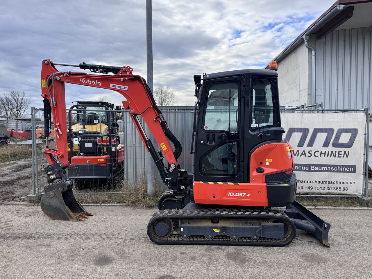 2023 Kubota KX037-4 mini excavator, side view