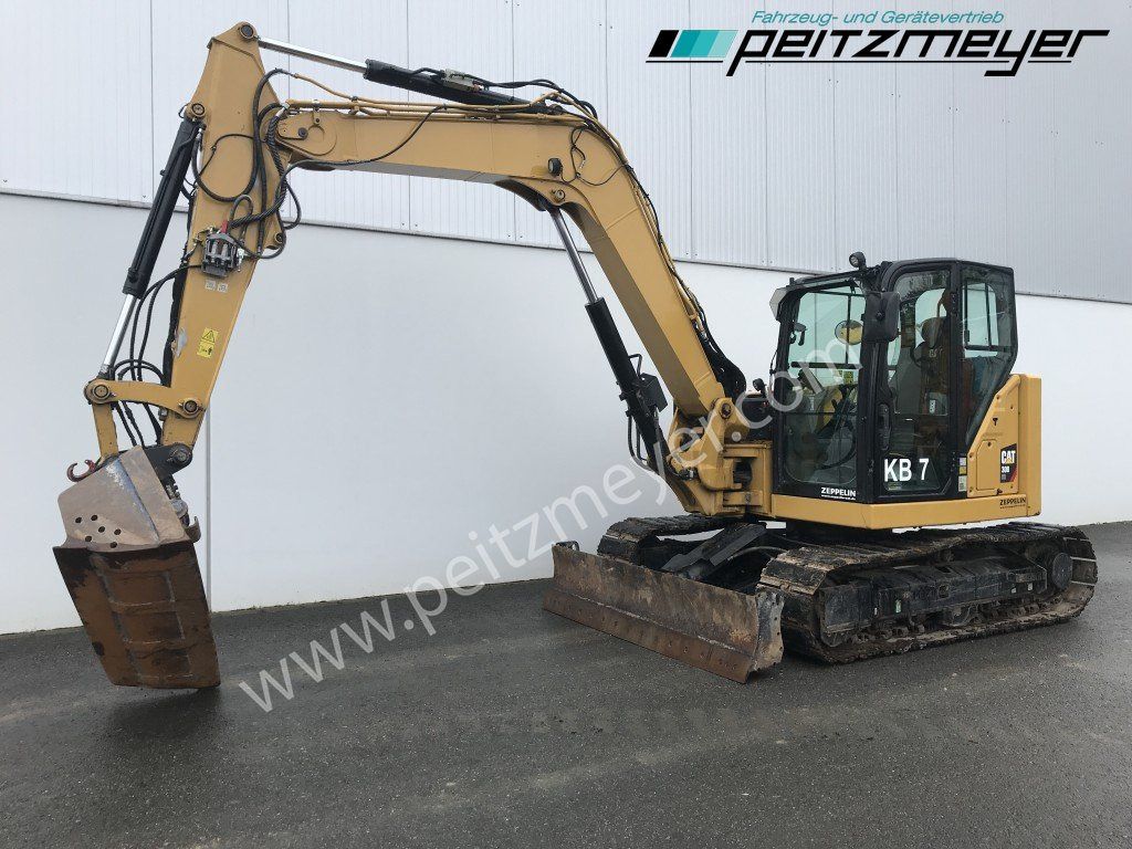 2019 Caterpillar 308-07 ECR mini excavator side view 2019 Caterpillar 308-07 ECR mini excavator side view