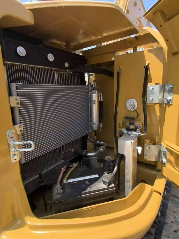 2023 Caterpillar 308E2 mini excavator engine compartment view 2023 Caterpillar 308E2 mini excavator engine compartment view