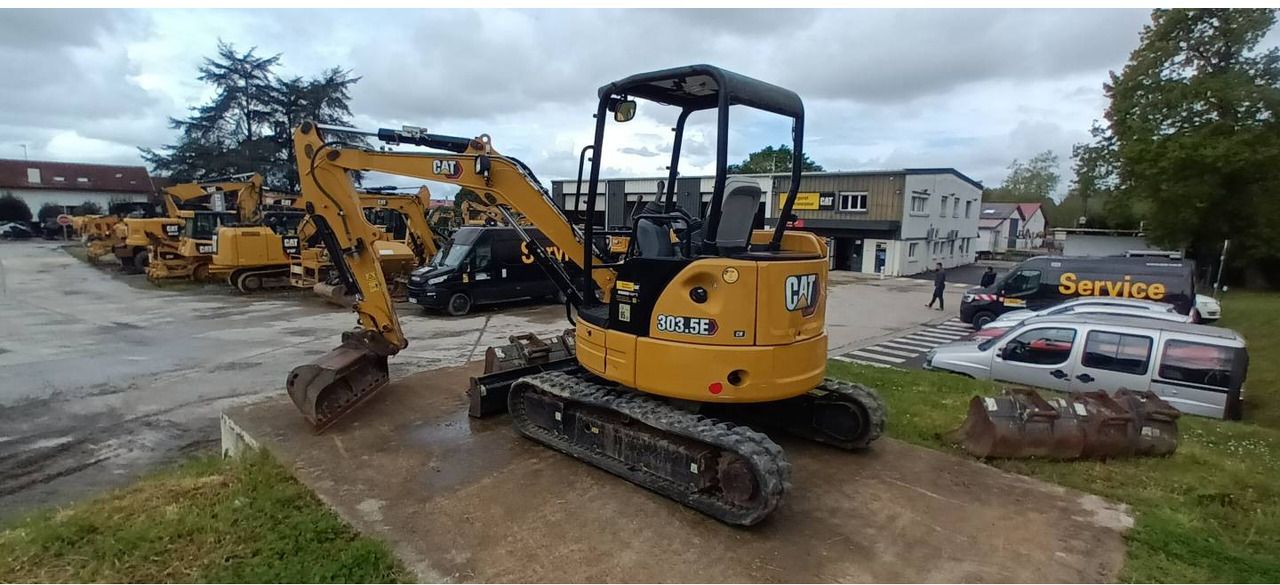 2020 Caterpillar 303.5E CR crawler excavator, rear three-quarter view