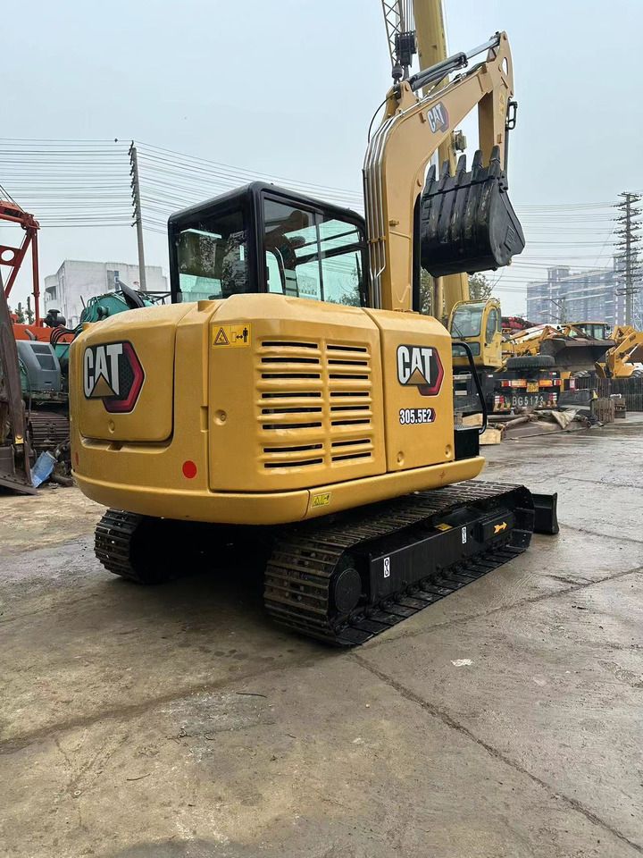 2021 Caterpillar 305.5E2 mini excavator rear three-quarter view