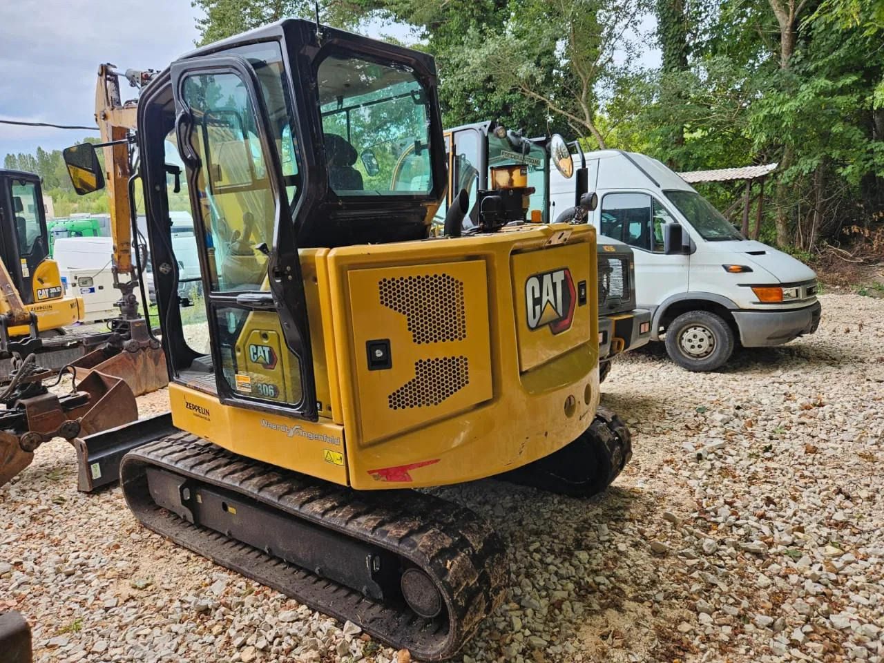 2021 Caterpillar 306CR mini excavator, rear three-quarter view 2021 Caterpillar 306CR mini excavator, rear three-quarter view