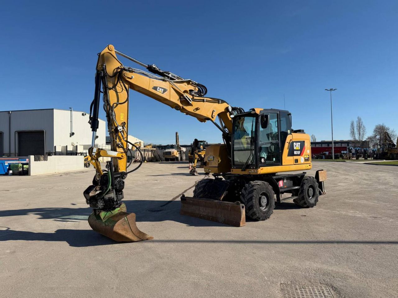 2019 Caterpillar M315F wheel excavator, side profile view
