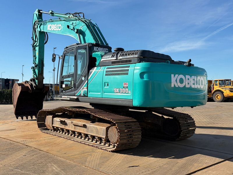 2021 Kobelco SK300LC-10E crawler excavator, rear three-quarter view 2021 Kobelco SK300LC-10E crawler excavator, rear three-quarter view