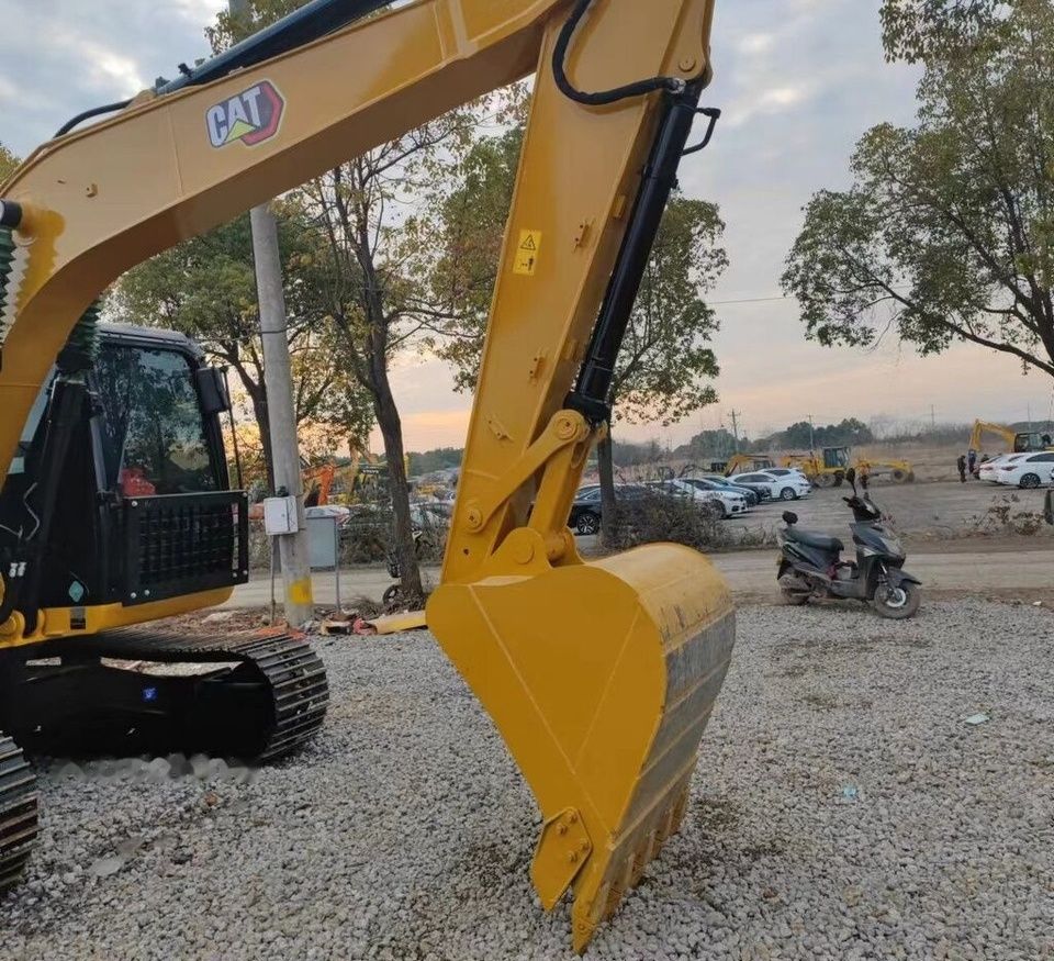 Caterpillar 312D2GC crawler excavator boom and bucket view