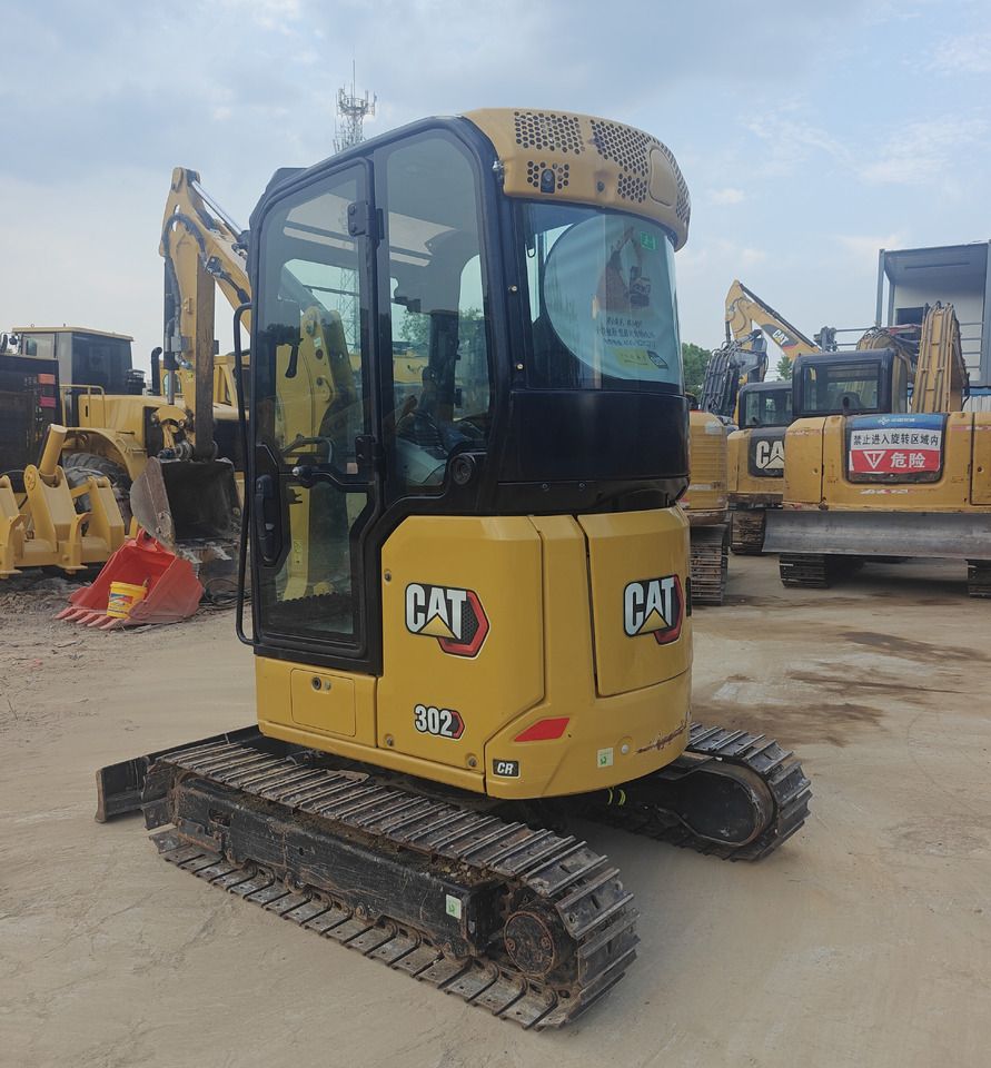 2020 Caterpillar 302CR mini excavator, rear three-quarter view
