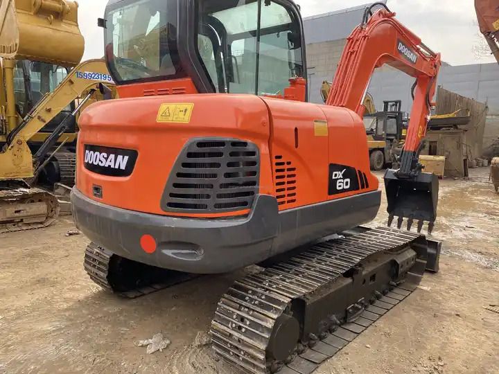 2018 Doosan DX60 crawler excavator, rear three-quarter view 2018 Doosan DX60 crawler excavator, rear three-quarter view