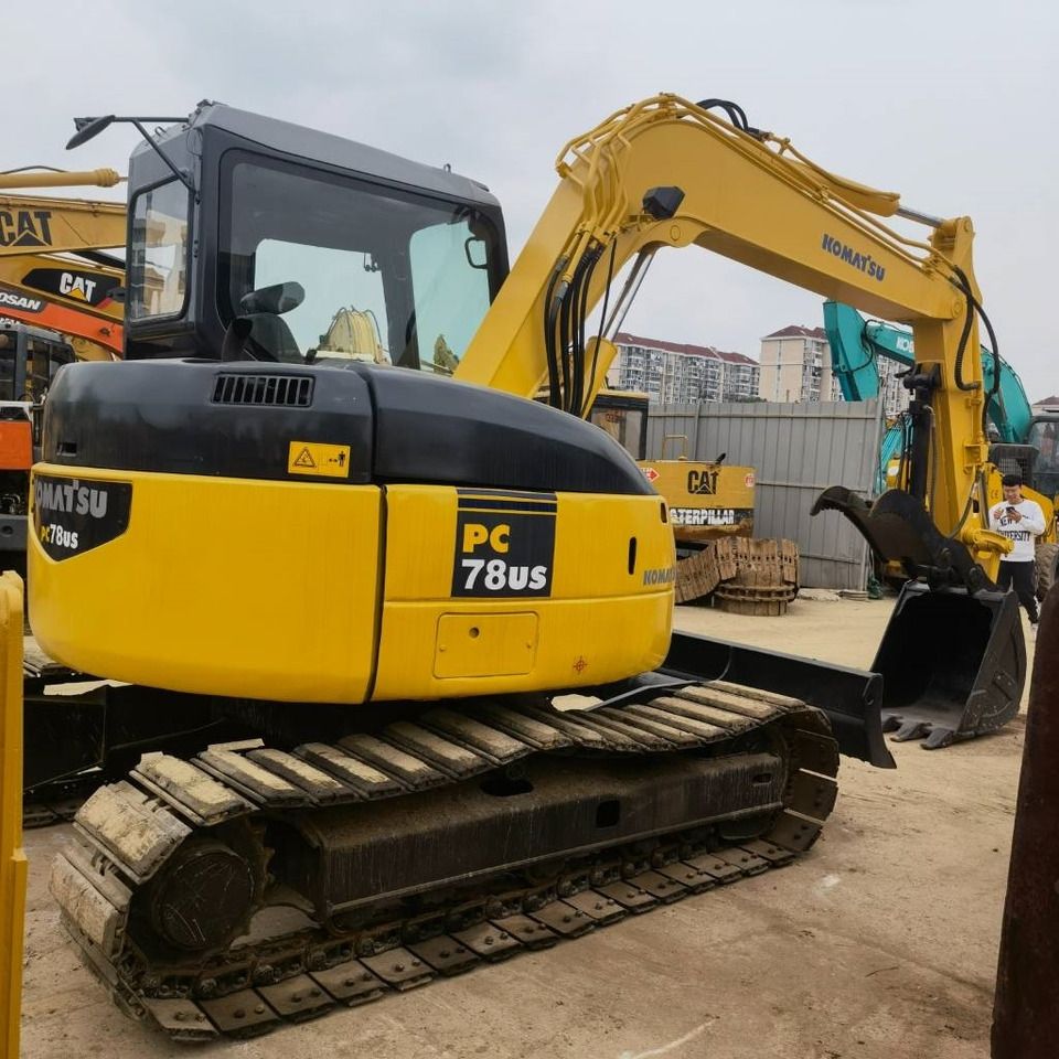 2023 Komatsu PC78US-6 mini excavator, rear three-quarter view 2023 Komatsu PC78US-6 mini excavator, rear three-quarter view