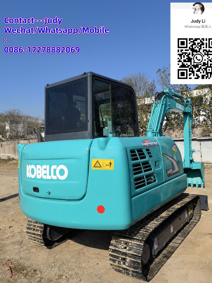 2022 Kobelco SK60 mini excavator, rear three-quarter view 2022 Kobelco SK60 mini excavator, rear three-quarter view