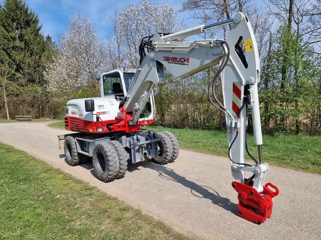 2015 Takeuchi TB295W wheel excavator side view 2015 Takeuchi TB295W wheel excavator side view