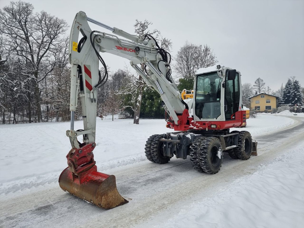 2019 Takeuchi TB295W wheel excavator, side profile view