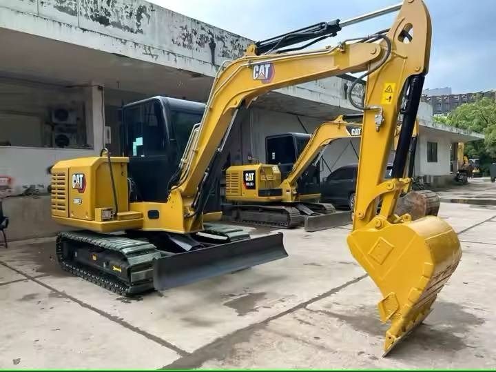 2020 Caterpillar 306E2 mini excavator, three-quarter front view 2020 Caterpillar 306E2 mini excavator, three-quarter front view