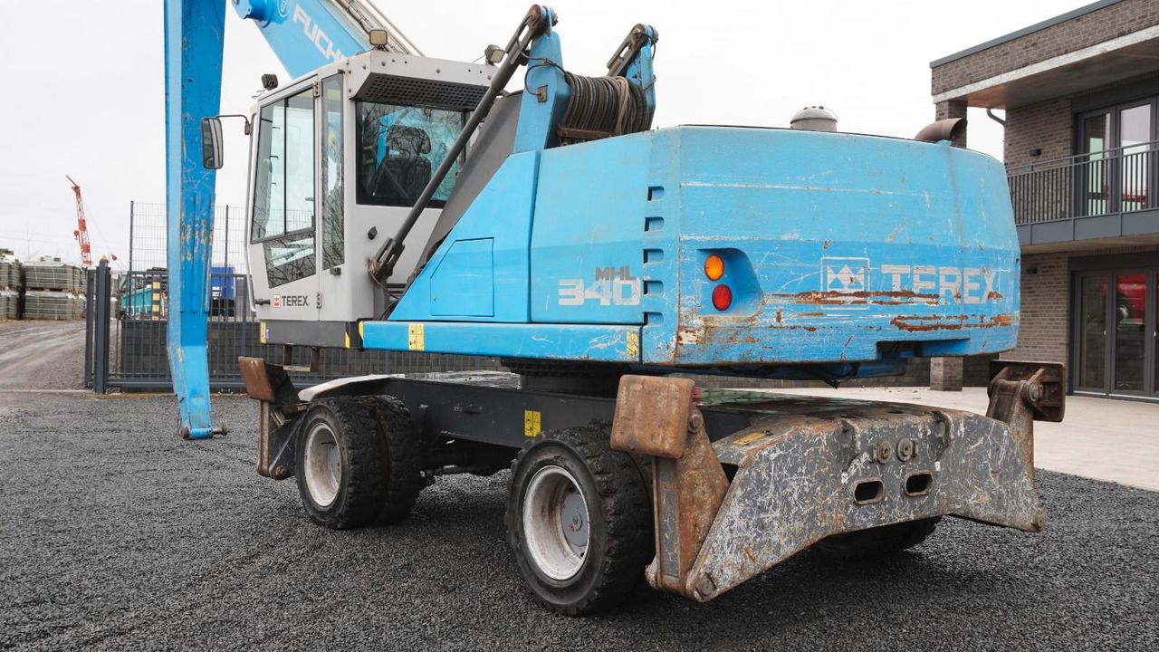 2017 Fuchs MHL340 wheel excavator, rear three-quarter view