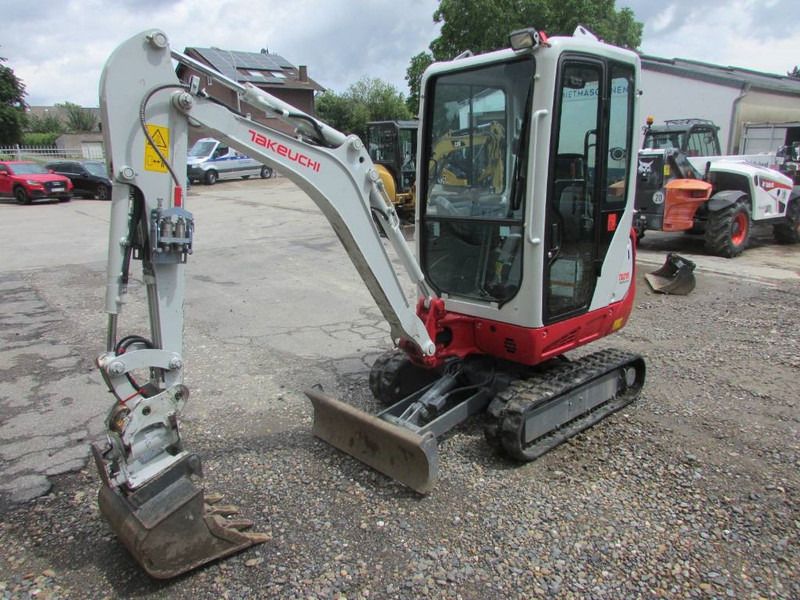 2023 Takeuchi TB216 V4 mini excavator, front three-quarter view 2023 Takeuchi TB216 V4 mini excavator, front three-quarter view