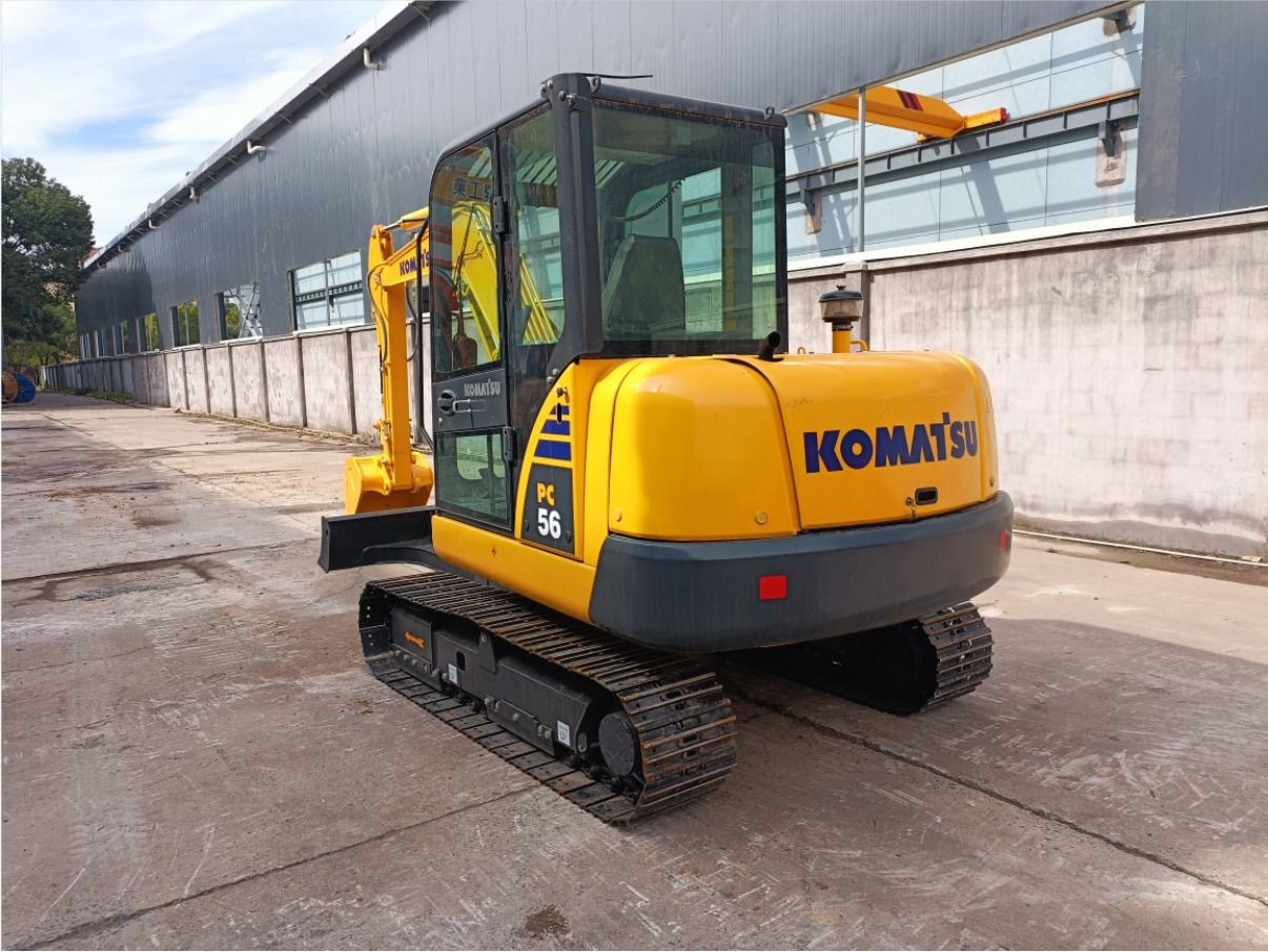 2022 Komatsu PC56 crawler excavator, rear three-quarter view 2022 Komatsu PC56 crawler excavator, rear three-quarter view