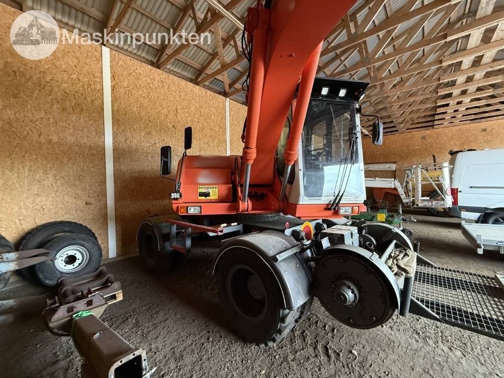 1998 Atlas 1404 wheel excavator, side view