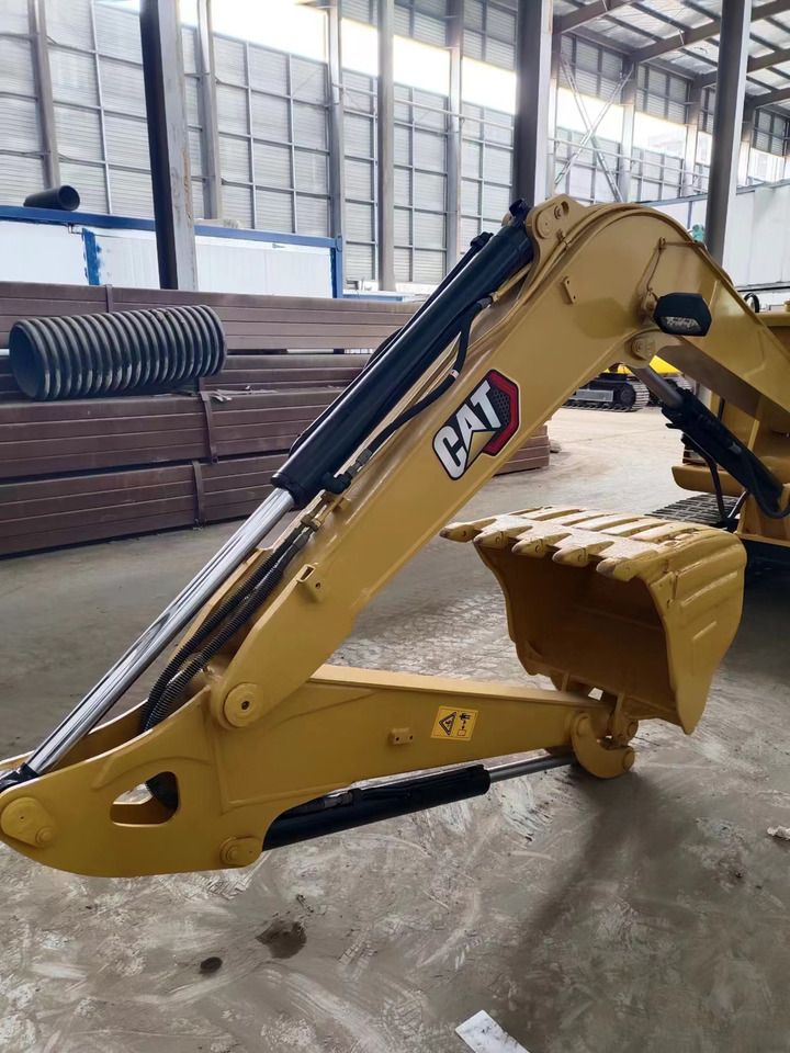 2021 Caterpillar 306E2 mini excavator boom and bucket detail 2021 Caterpillar 306E2 mini excavator boom and bucket detail