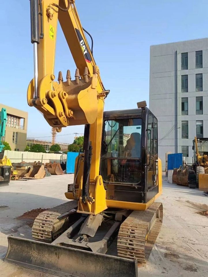 2024 Caterpillar 305.5E2 mini excavator, front three-quarter view 2024 Caterpillar 305.5E2 mini excavator, front three-quarter view