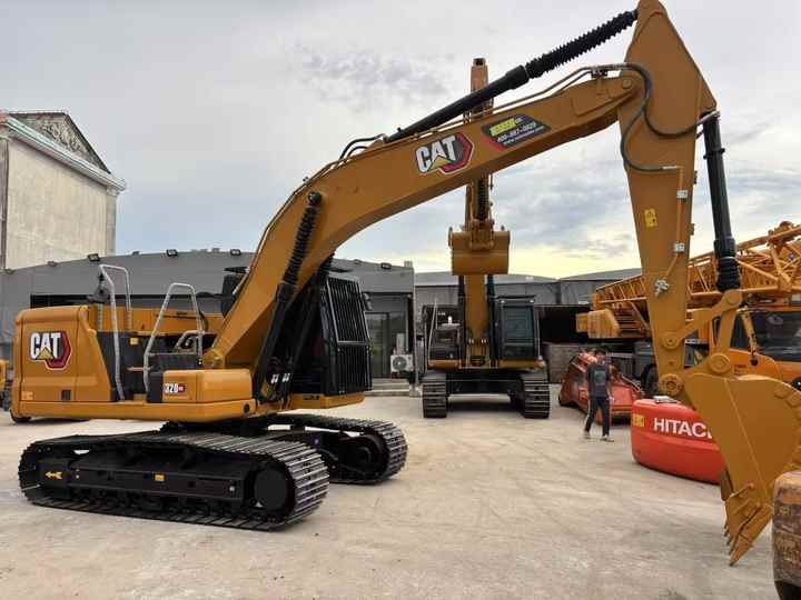 2024 Caterpillar 320GC crawler excavator side view