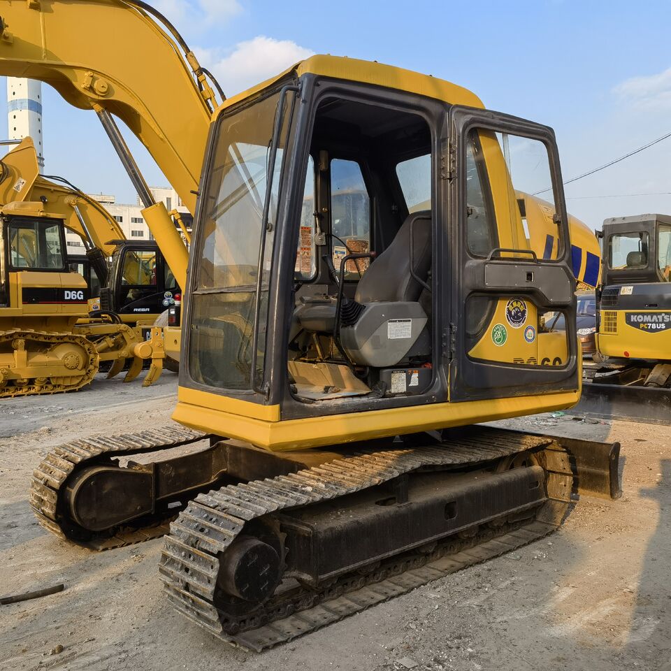 2024 Komatsu PC60 excavator, side view of cab and tracks 2024 Komatsu PC60 excavator, side view of cab and tracks