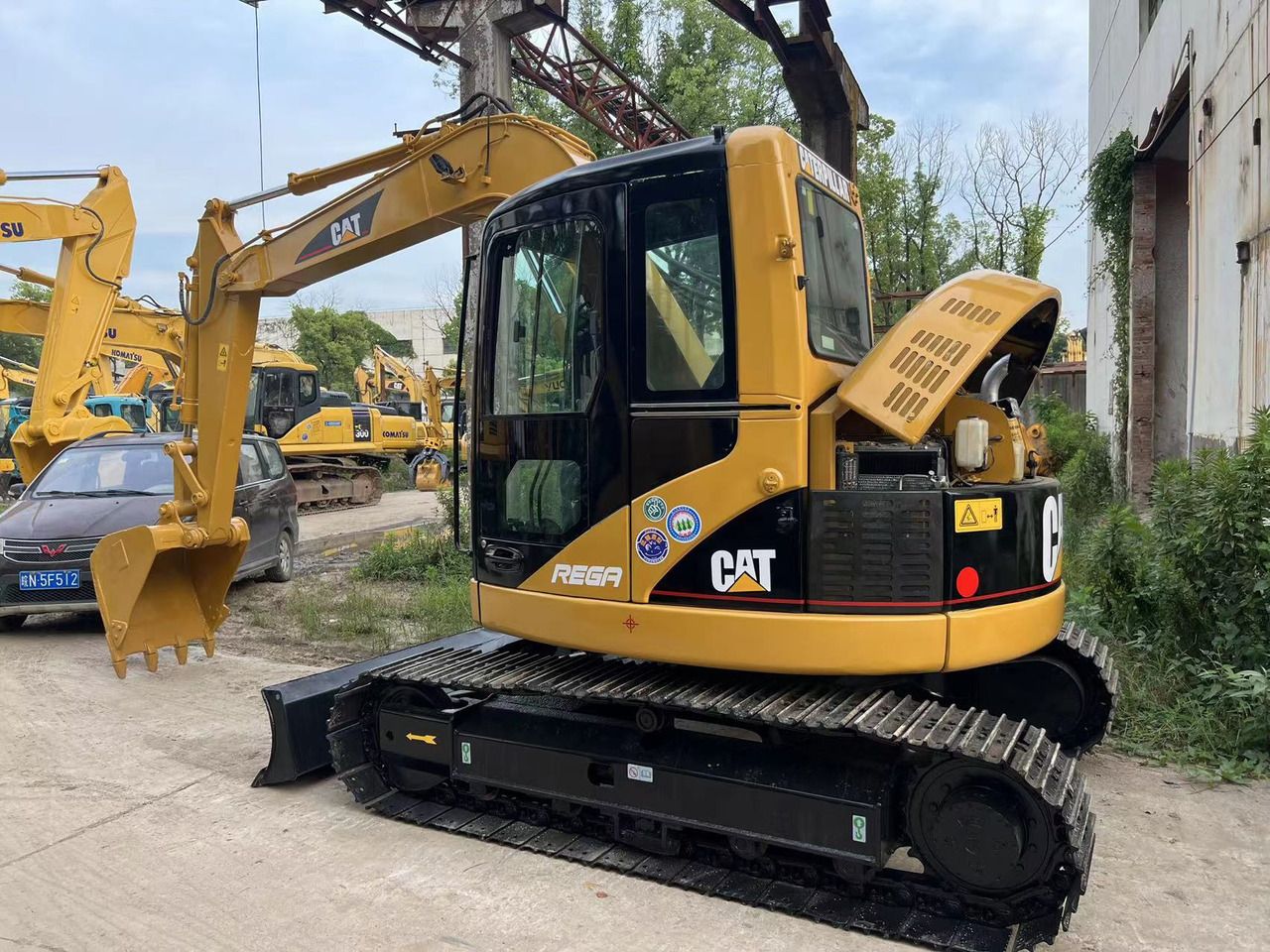 Caterpillar 308C excavator, side view Caterpillar 308C excavator, side view