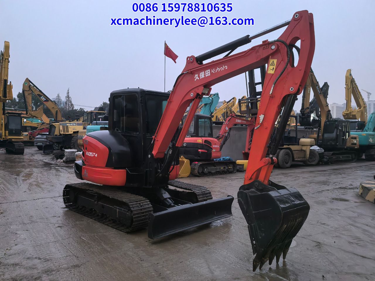 2023 Kubota KX057-4 mini excavator, side view