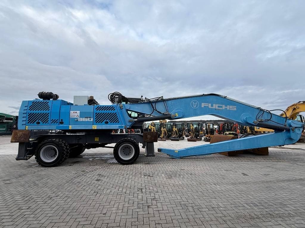 2015 Fuchs MHL360 material handler, side view