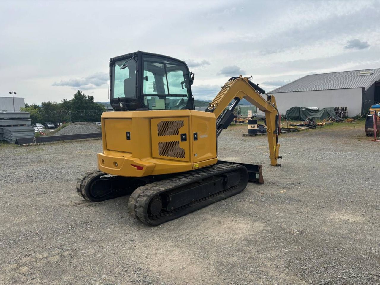 2023 Caterpillar 305 crawler excavator, rear three-quarter view 2023 Caterpillar 305 crawler excavator, rear three-quarter view