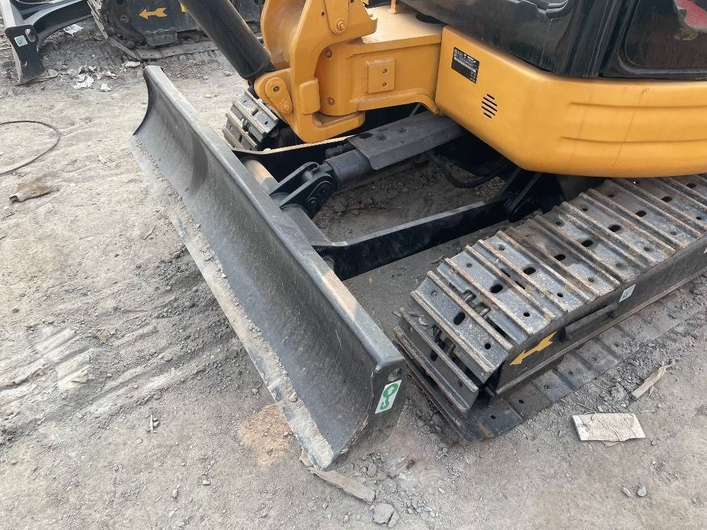 2025 Caterpillar 303 mini excavator front blade and tracks view 2025 Caterpillar 303 mini excavator front blade and tracks view