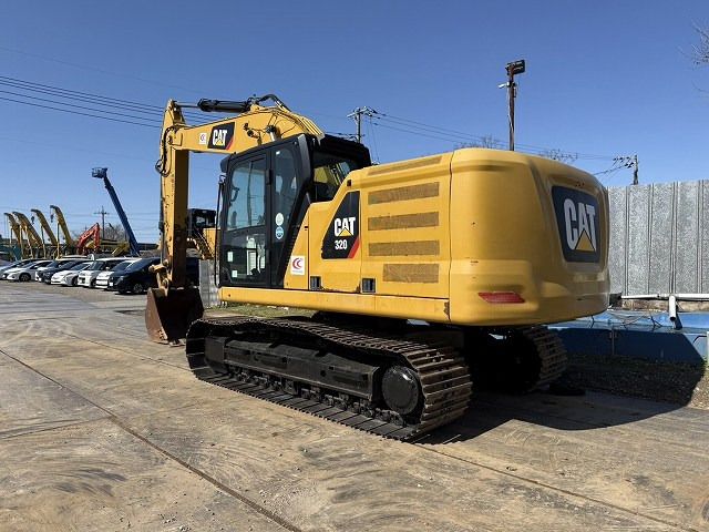 2018 Caterpillar 320 crawler excavator, rear three-quarter view